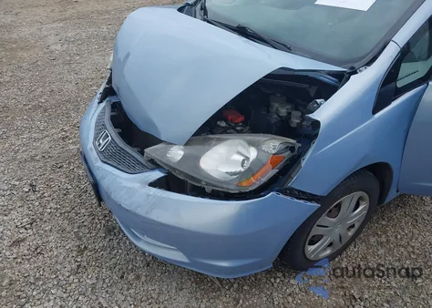 2009 Honda Fit from USA, damaged, VIN JHMGE87219S074372